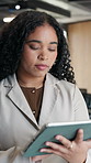 Tablet, business and woman in company, review report and compliance email for risk management. Technology, typing and serious advisor in office with research, policy regulation and reading proposal
