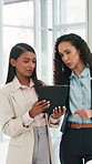Tablet, discussion and business women in office for research on finance forecasting for investment. Digital technology, meeting and female financial advisors with planning for budget prediction.
