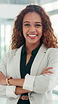 Arms crossed, face and laughing with woman lawyer in office for legal council or representation. Funny, law firm and legislation with female attorney at agency for court case, hearing or trial