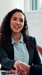 Happy woman, meeting and business with handshake in boardroom for marketing strategy or partnership. Female person, employees or colleagues shaking hands with smile, applause or team for agreement
