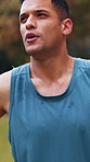 Fatigue, fitness and thinking with man outdoor in park for commitment to training or workout routine. Breathing, exercise and sweat with tired runner in nature for dedication, intensity or wellness