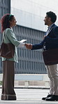 Teamwork, handshake or business people with tablet in city, greeting or partnership for urban project. Introduction, tech or staff shake hands for real estate agreement, property development or deal