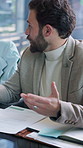 Business, man and talking with document in office for planning, legal advice and case file. Male person, attorney and discussion with folder for evidence, witness statement and testimony for lawsuit