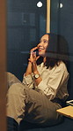 Businesswoman, talk and phone call in office pod with smile, gossip conversation and marketing job. Happy, person and communication in cubicle with tech, contact and networking for advertising work.
