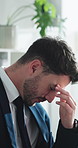 Frustrated, businessman or stress with headache in office for corporate bankruptcy or debt. Man, accountant or employees thinking with migraine or pain for mistake, financial crisis or bad investment