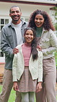 Face, parents and child in front yard with new home, property investment and smile for real estate. Happy people, mother and father outdoor with daughter, dream house or family bonding for relocation