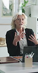 Mature, woman and meeting with financial advisor for discussion or administration in office. Female person, business or explaining terms and conditions with client for finance advice in workplace