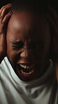 Angry, shouting and woman with anxiety, mental health and stress for emotional abuse on black background. Face, studio and African person with depression, ptsd and screaming for memories of trauma.
