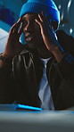 Black man, night and thinking with frustrated hacker in server room for cybercrime or digital theft. Hacking, problem solving and stress with person in dark data center for network or system breach