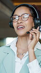 Consultant, woman and happy with headset in office for loan assistance, online support and CRM. Glasses, financial advisor and contact with tech for insurance claim, policy update or customer service