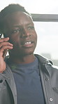 Speaking, window and black man with phone call in agency, planning launch date and campaign agenda. Branding, talking or marketer with mobile for project management, schedule organization or feedback