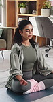 Meditation, breathe and woman in home with lotus pose for balance, mental wellness and health. Apartment, morning and person on yoga mat for holistic healing, mindfulness and calm mindset on floor