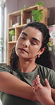 Stretching, arms and woman in home for yoga, exercise and warm up to start day in morning. Apartment, thinking and person with fitness routine for wellness, mobility and active hobby in living room