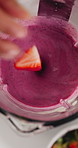 Above, blender and hands in kitchen for smoothie, wellness benefits and fruit for detox in home. Person, appliance and liquid with organic ingredients, strawberry or banana for nutrition at apartment
