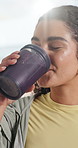 Smoothie, smile and face of woman in kitchen for protein shake, wellness and nutrition. Vitamins, gut health and breakfast beverage with person in home for diet drink, supplements and happiness
