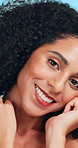 Face, shine and woman in studio, cosmetics and dermatology on blue background. Happiness, aesthetic and person with wellness, beauty and treatment for healthy skin, glow and grooming with skincare