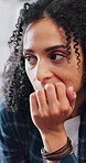 Nervous, biting nails and woman in home, stress and anxiety for fear, worry and mental health. Apartment, pressure and person with depression, horror and ptsd trauma with bad habit and reflection