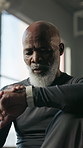 Fitness, goals and smart watch with black man in gym for performance, progress on tracking app. Timer, exercise and digital tech with mature person in health club for training, wellness or routine