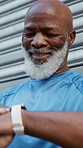 Smart watch, fitness and mature black man in city for tracking exercise, workout app and health. Sports, runner and happy person with tech to check time, wellness stats and training progress in town