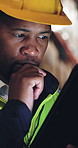 Man, thinking and typing in warehouse with tablet, supply chain and check email for export dispatch. Black person, reading and shipping plan in depot with tech, helmet or scroll for logistics report.