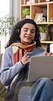Headset, laptop and remote work with happy woman in home living room for feedback or support. Computer, customer service and smile with person in apartment for video call or virtual assistance