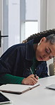 Woman, writing and laptop with book in office for schedule planning, agenda or tasks. Female person, planner or taking notes with computer, notebook or diary for reminder, project ideas or research