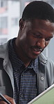 Writing, research or black man in office with tablet, brainstorming or insight in marketing campaign. Plan, tech or creative clerk with notes, problem solving or project checklist for brand awareness