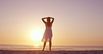 Travel, sunset and peace with woman at beach for summer vacation, tropical island and seaside. Holiday getaway, weekend break and freedom with person outdoor for wellness, ocean and paradise space