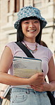 College, face or woman on campus with book, knowledge or scholarship in study opportunity. Happy, education or student outdoor with confidence, university funding or pride in academic development.
