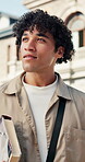 Walking, thinking and man with textbook on campus, academic course and learning for education. Smile, reflection and college student with studying for knowledge, class journey or scholarship vision