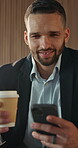 Coffee, phone and text message with business man in office for break, communication or response. Drink, social media and typing with happy employee in workplace lobby for mobile or online chatting
