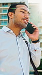 Low angle, frustrated and man with phone call, business and screaming for stress communication. Outdoor, lens flare and person in city, tech for chatting and upset for schedule, shouting and angry