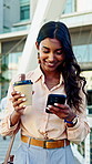Businesswoman, travel and chat with phone in city, communication and commuting with coffee on street. Outdoor, employee and happy person with beverage on walk, reading and texting with mobile app
