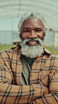 Face, smile or black man in greenhouse with arms crossed, pride or experience in agriculture industry. Portrait, happy or mature farmer with confidence, career or production in sustainable business.