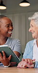 Laughing, old woman and caregiver with tablet in nursing home, senior care or results review on web. Happy people, talk and nurse with tech for medical diagnosis, homecare or elderly patient recovery