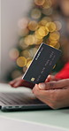 Christmas, credit card or hands with laptop in home, online shopping or festive season sale for gift. Bokeh, holiday discount or person with pc for ecommerce, present payment or typing bank details
