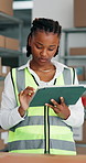 Supply chain, boxes and black woman in factory, tablet for online checklist and report for manufacturing. Person, planning or employee in workplace, tech for quality assurance or app for distribution