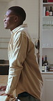 Thinking, window and black man in kitchen, smile and contemplation for memory, nostalgia and choice. Happy, wonder and African person in home, reflection and remember with decision and inspiration