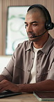 Telemarketing, laptop and man with headset in business, communication and lead generation on website. Call center, representative and person with mic for discussion, smile and consultation for sales