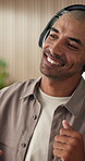 Happy, headphones or man in office with dancing, feeling beat or listening to music playlist. Smile, rhythm or male person in agency with tech, song streaming or radio subscription on audio app.