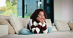 Bored, child and tablet with girl on sofa in home living room for contemplation or daydreaming. App, thinking and unhappy kid with depression in apartment for memories, nostalgia or perspective