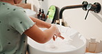 Washing, soap and hands of child in bathroom of home for disinfection, self care and hygiene routine. Cleaning, water and sanitary with kid at basin in house for bacteria prevention and wellness