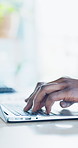 Hands, lawyer and typing with laptop in office for research, court case and lawsuit preparation. Space, person or attorney with pc for online evidence, witness statement and testimony for prosecution