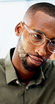 Frustrated, black man and laptop with bad news for financial crisis, loss or failure in office. Business person, upset or disappointed with stress for mistake, bankruptcy or debt at workplace