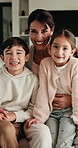 Happy, relax and face of family on sofa in home with bonding, love and connection together. Smile, people and portrait of mother with children for support, care and safety in living room at apartment