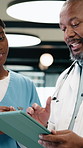 Doctor, nurse and talk in clinic with tablet, mentorship advice and research for medical internship. Black people, discussion and manager in hospital with tech, training intern or tips for healthcare