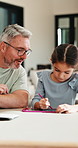Father, child and writing with tablet at house for education, studying and exam preparation. Parent, help and daughter with sketch pad for learning, school homework and quiz assignment for knowledge