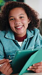 Child, face and elearning with tablet in house, growth and skill development with assignment on web. Online education, kid and girl with tech for knowledge, research and digital activity in home