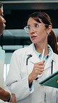 Healthcare, doctors and team with tablet in hospital, talk or research for treatment plan on website. Clinic, health professional and people with tech for medical history, online and collaboration