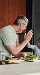 Dad, vegetables and high five with kid in kitchen for meal prep, healthy diet or cooking lunch. Father, child or daughter learning with natural ingredients for culinary lesson or hospitality in home